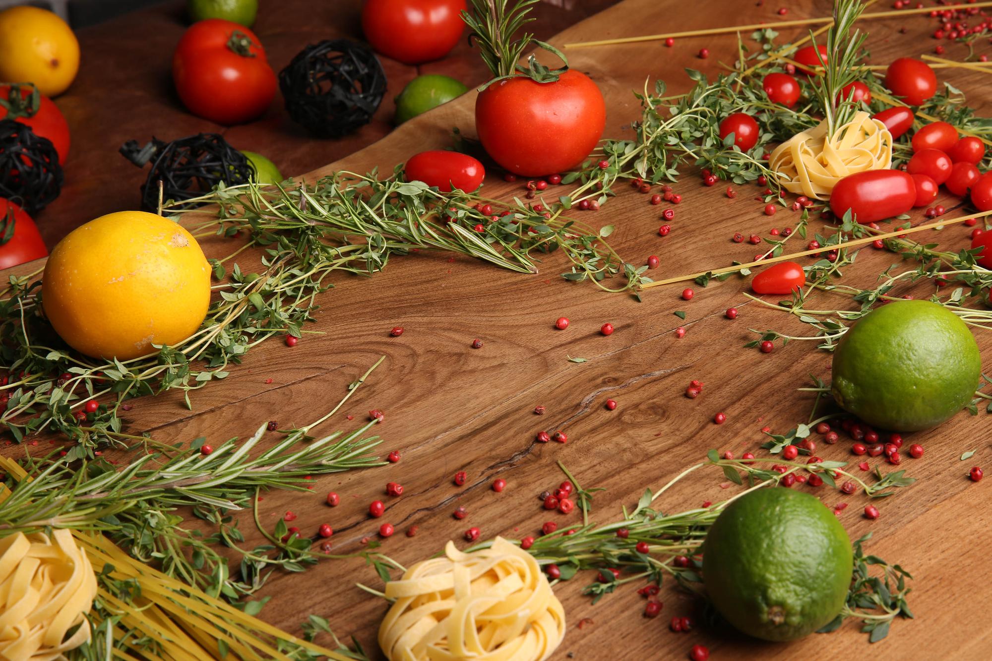 Close-up of seasonal ingredients on a wooden table